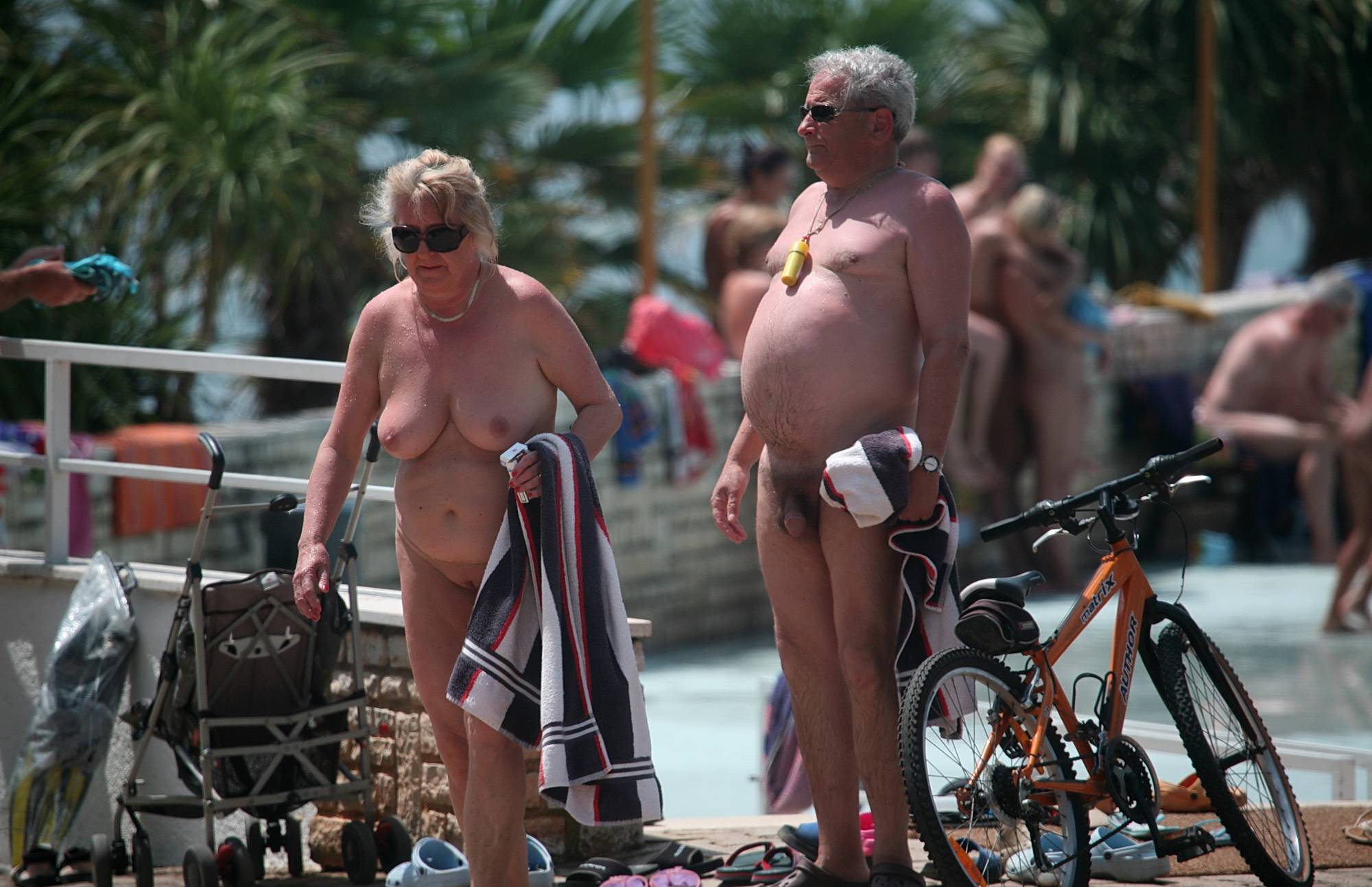Pure Nudism Pics Biking At Edge Of The Pool - 1